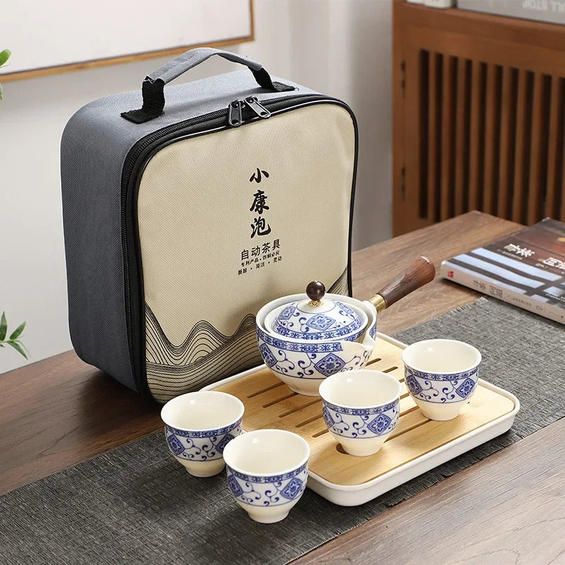 360° Rotation Porcelain Gongfu Tea Set – Elegant Ceramic Infuser Cup with Travel Case