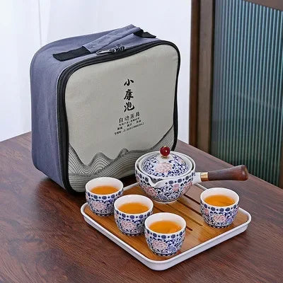 360° Rotation Porcelain Gongfu Tea Set – Elegant Ceramic Infuser Cup with Travel Case